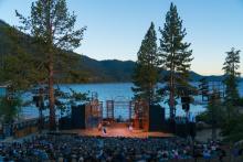 actors stage with waters of tahoe in background